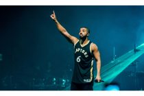 drake pointing to the sky